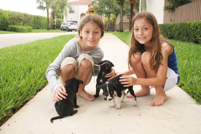 Alexandria and Sydney love helping animals in need, like these puppies they helped foster!