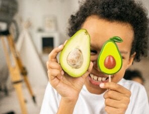 boy with avocados