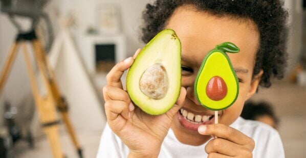 boy with avocados