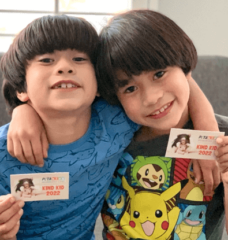 kids with their PETA Kids membership card