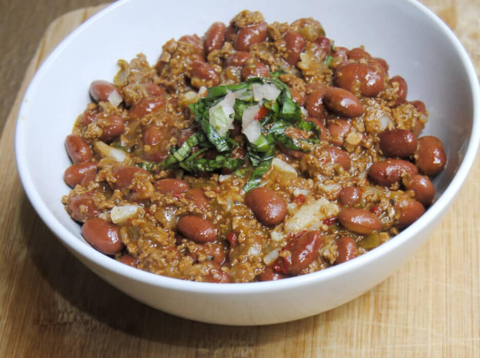 a bowl of vegan chili on a table