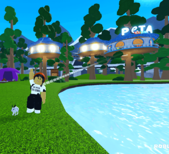 Roblox character in Seaboard City's Park Place outside of PETA Kids HQ waving with the rescued rabbit