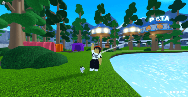 Roblox character in Seaboard City's Park Place outside of PETA Kids HQ waving with the rescued rabbit