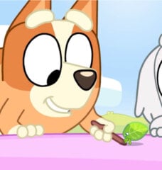 characters Bingo and Lila from Bluey with a green caterpiller